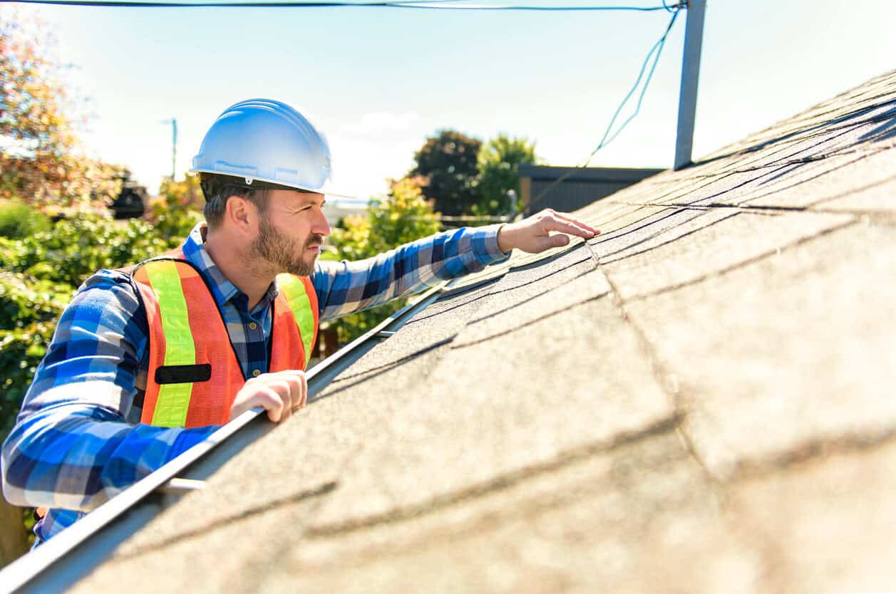 Contractor completes checklist for getting a roof inspection in Austin